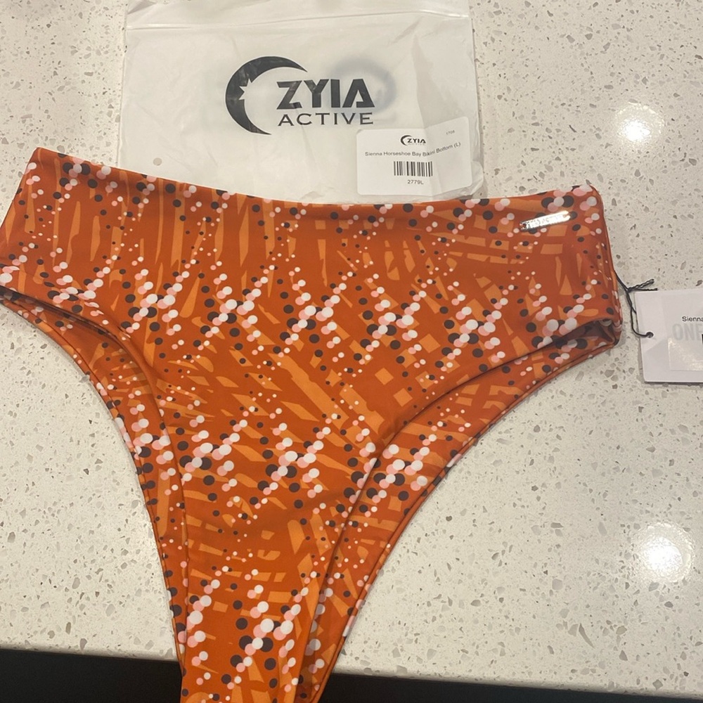 Size L ZYIA NWT swim bottoms: Sienna Horseshoe Bay